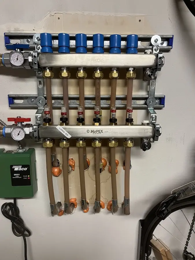 Plumber performing Gas Line Installation at a residential property in Chickasaw